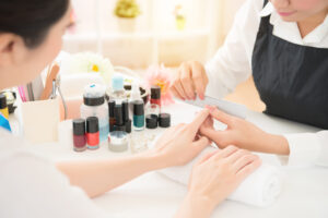 Close,Up,Of,Manicurist,Doing,Nail,Mill,By,Using,Polisher